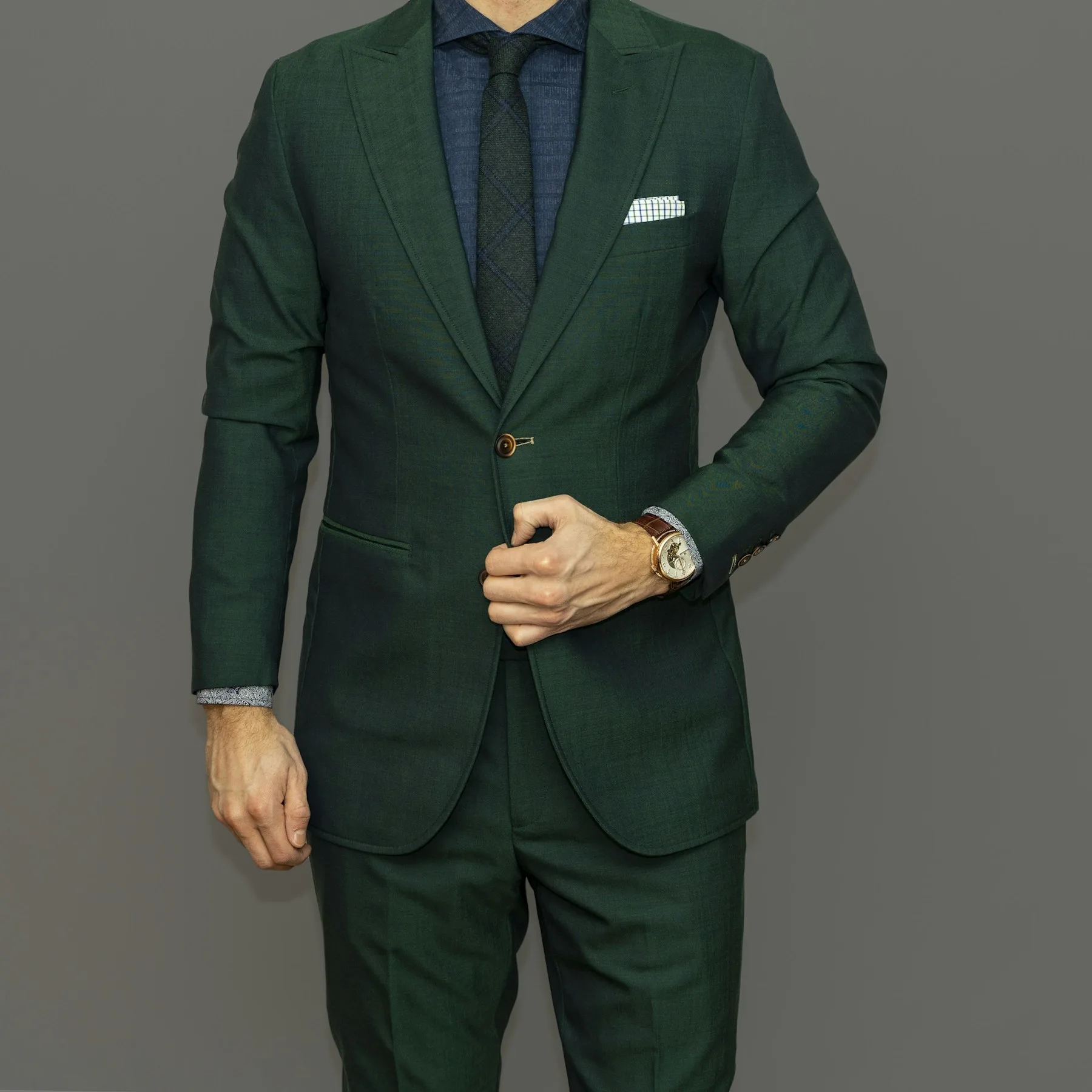 Refined tailoring studio with garments prepared for fitting