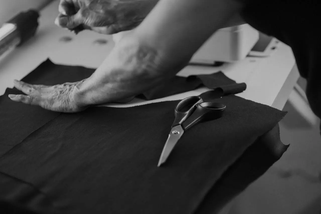 Tailoring workroom with garments and fabric details